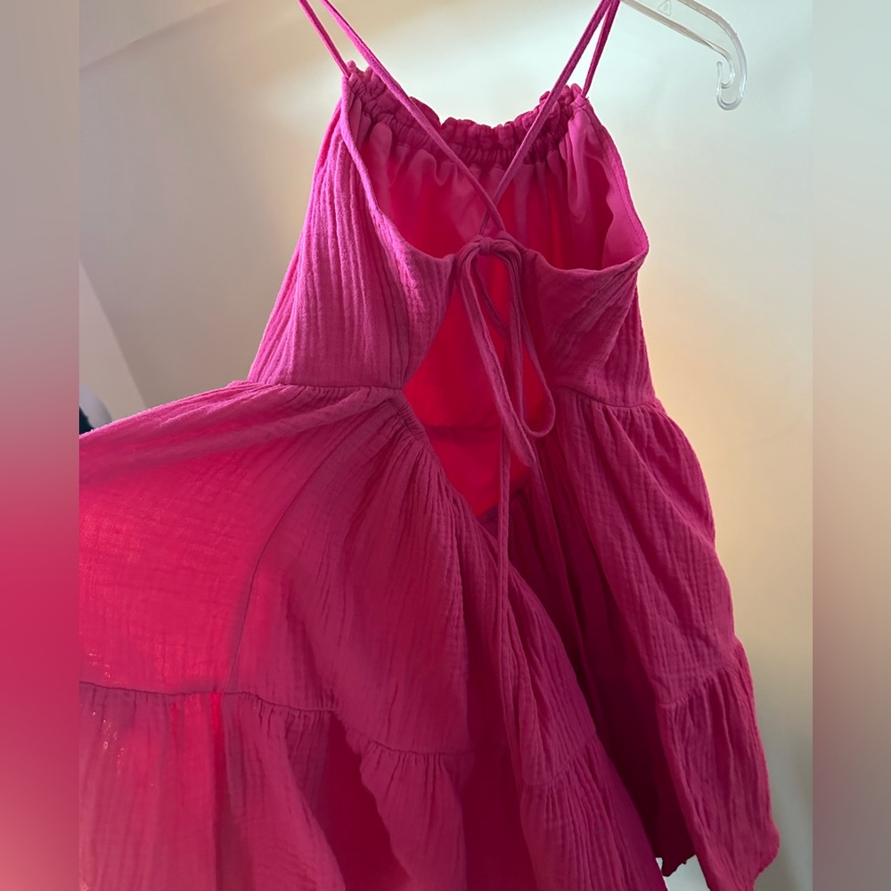Hot pink mini dress, cute with an open back!